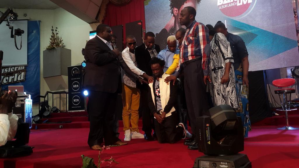 Bahati being prayed for by Pastor Albo