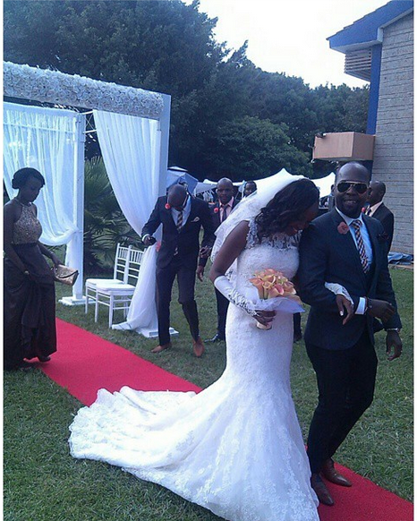 Alex Mwakideu And His Wife 