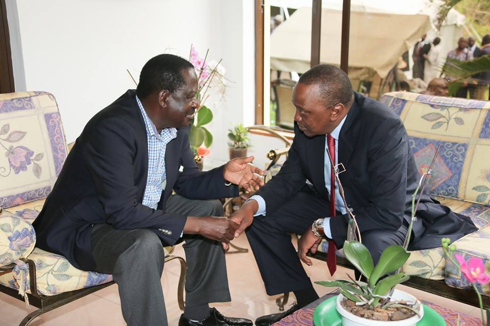 Uhuru consoling Raila Odinga
