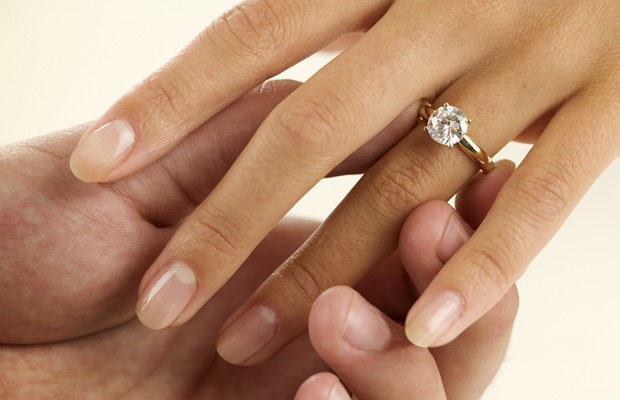 Woman Receiving Engagement Ring