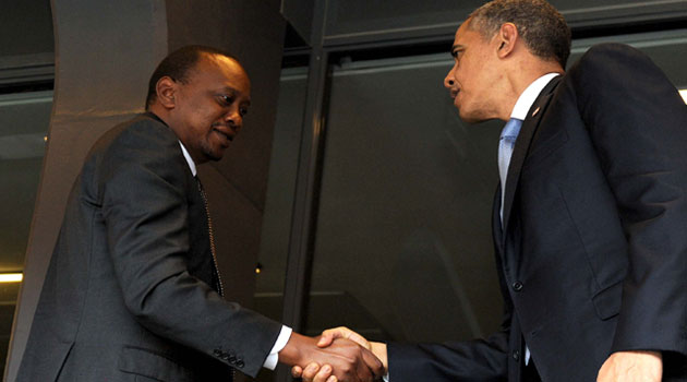 Obama  greets President Kenyatta