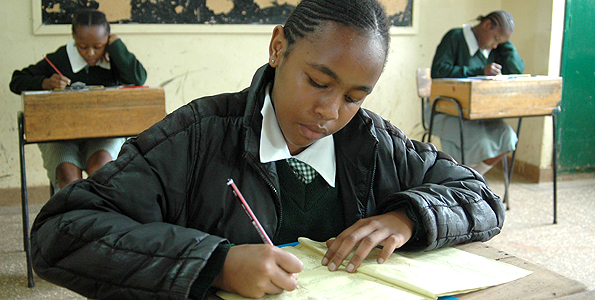 Photo/JAMES NJUGUNA Sharon Wanjiru ,candidate at Westlands Primary School tackles the KCPE exam mathematics paper yesterday.